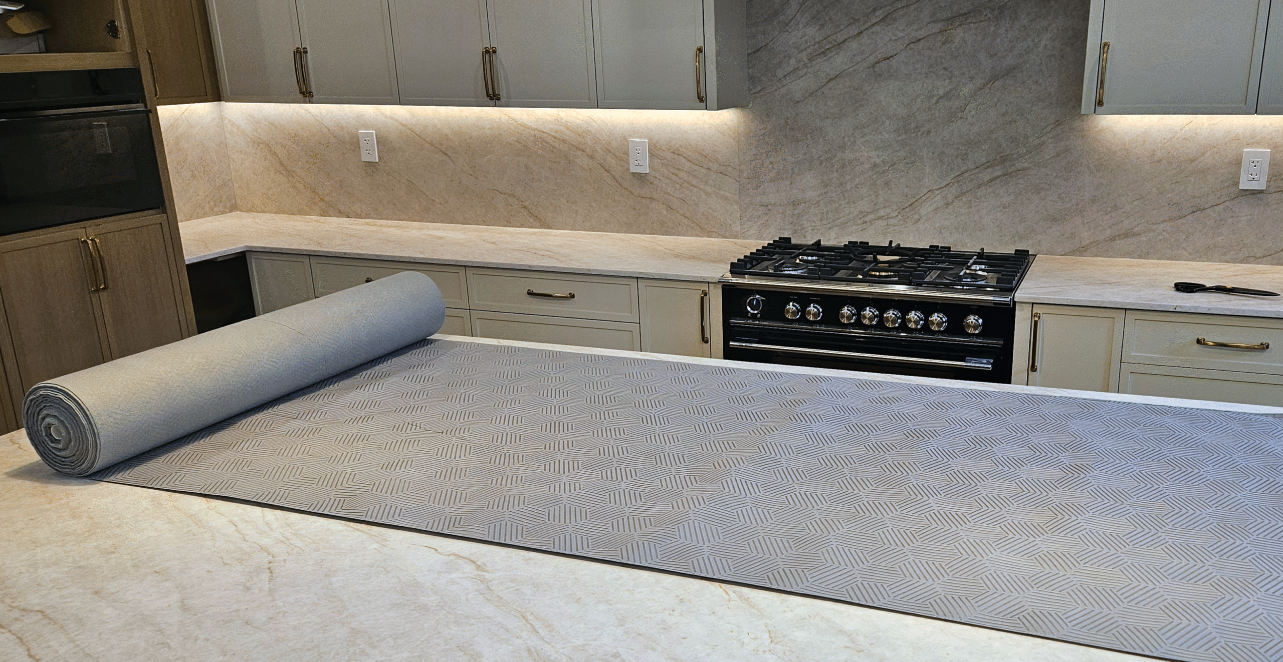 Gator Guard Glufelt countertop floor‑and‑surface protection roll partly unrolled on countertop